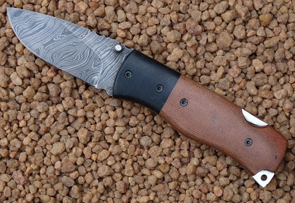 reebok-damascus-folder-light-brown-micarta-handle-plates